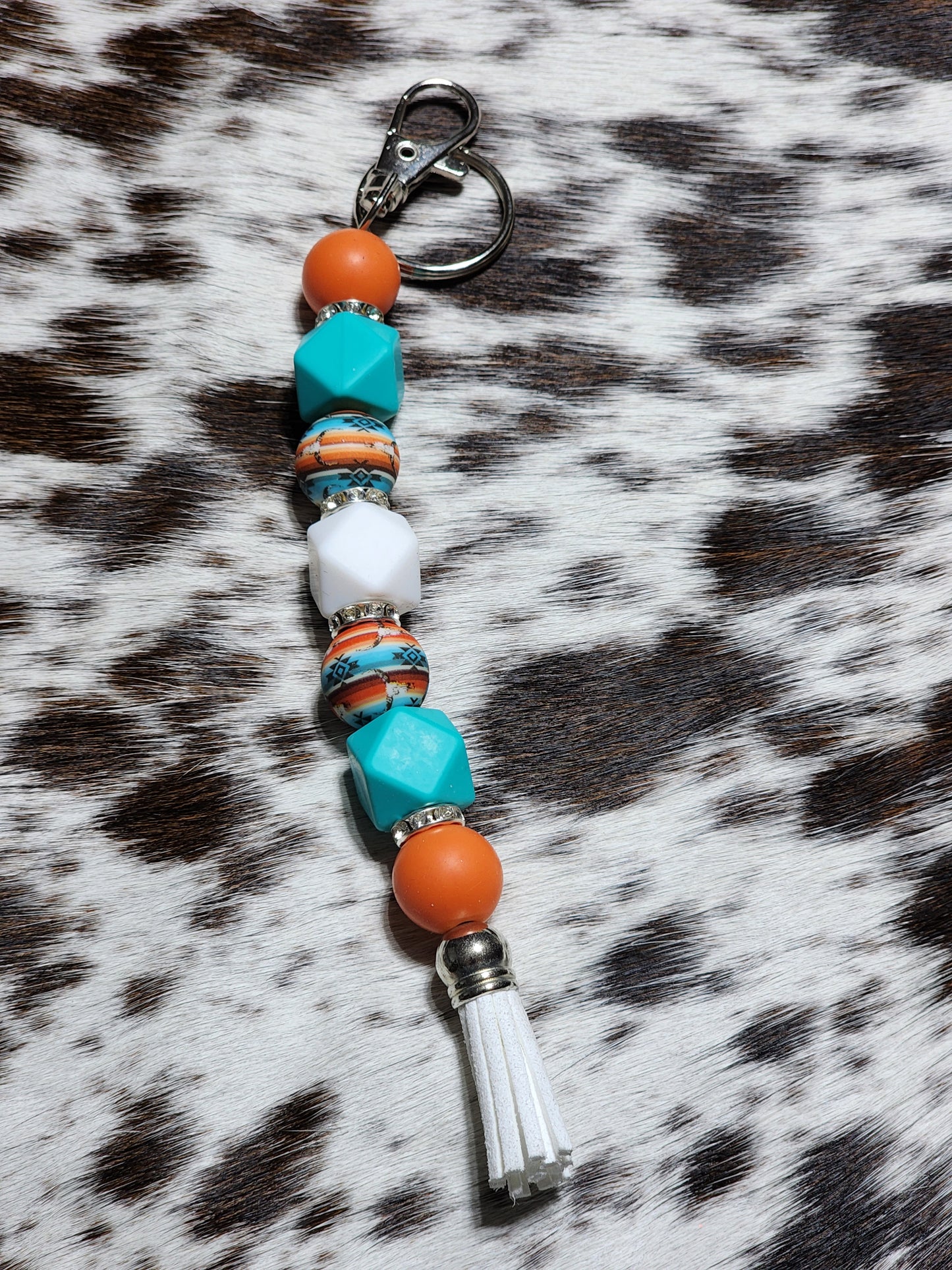 Orange Sunset western beaded keychain with turquoise beads and tassel