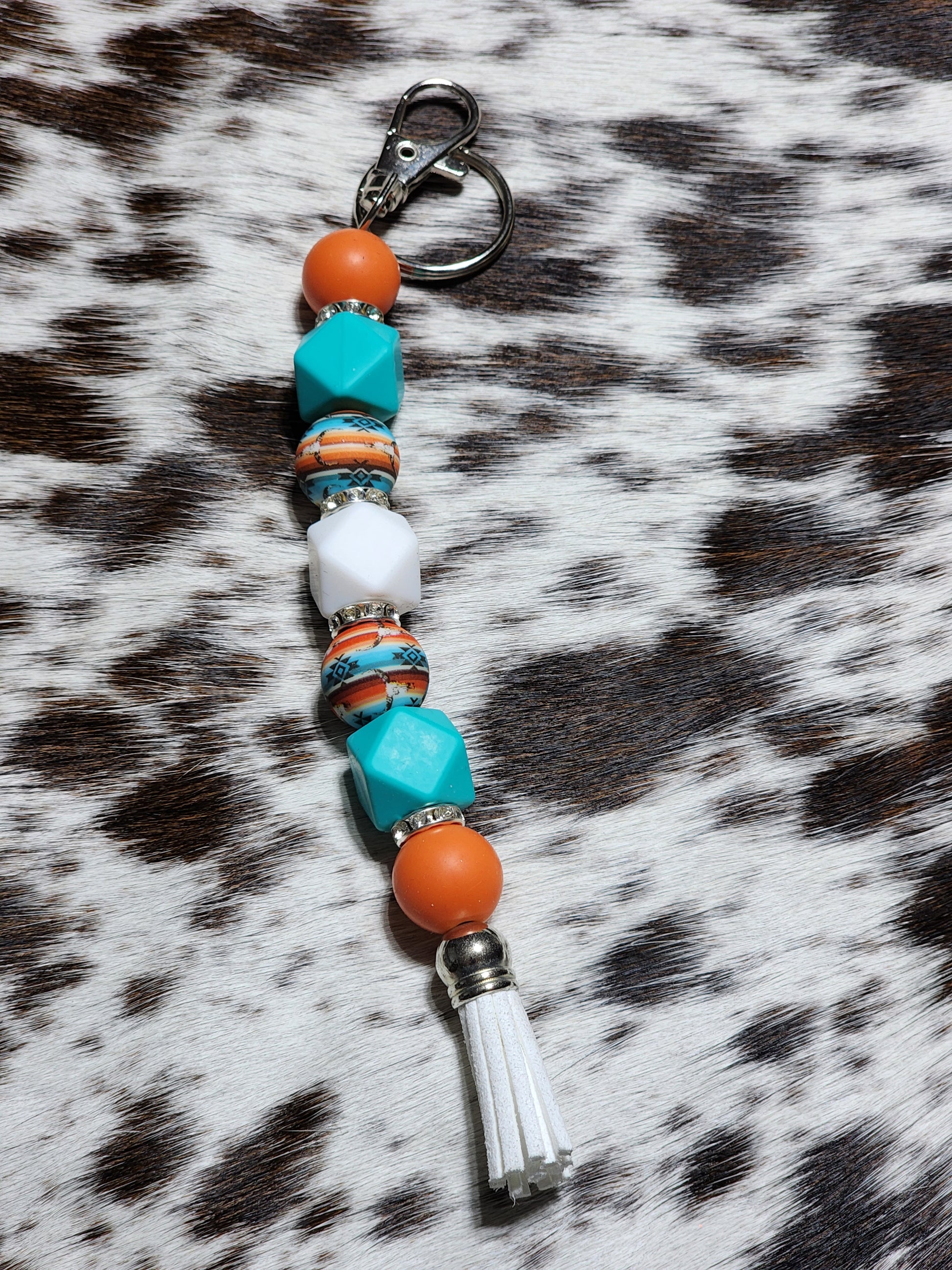 Orange Sunset western beaded keychain with turquoise beads and tassel